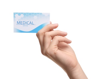 Woman holding business card isolated on white, closeup. Medical service