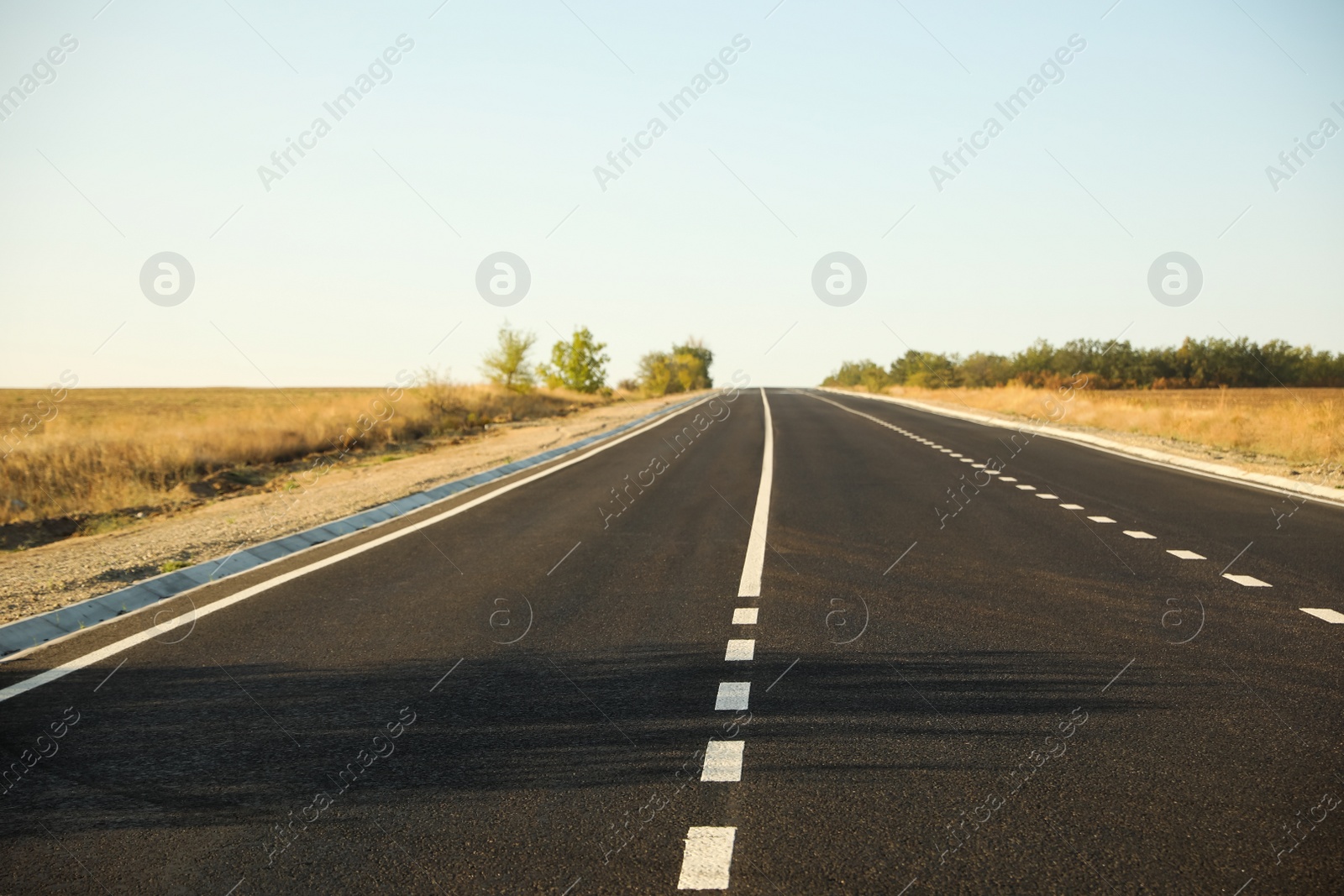 Photo of Beautiful view of empty asphalt highway. Road trip