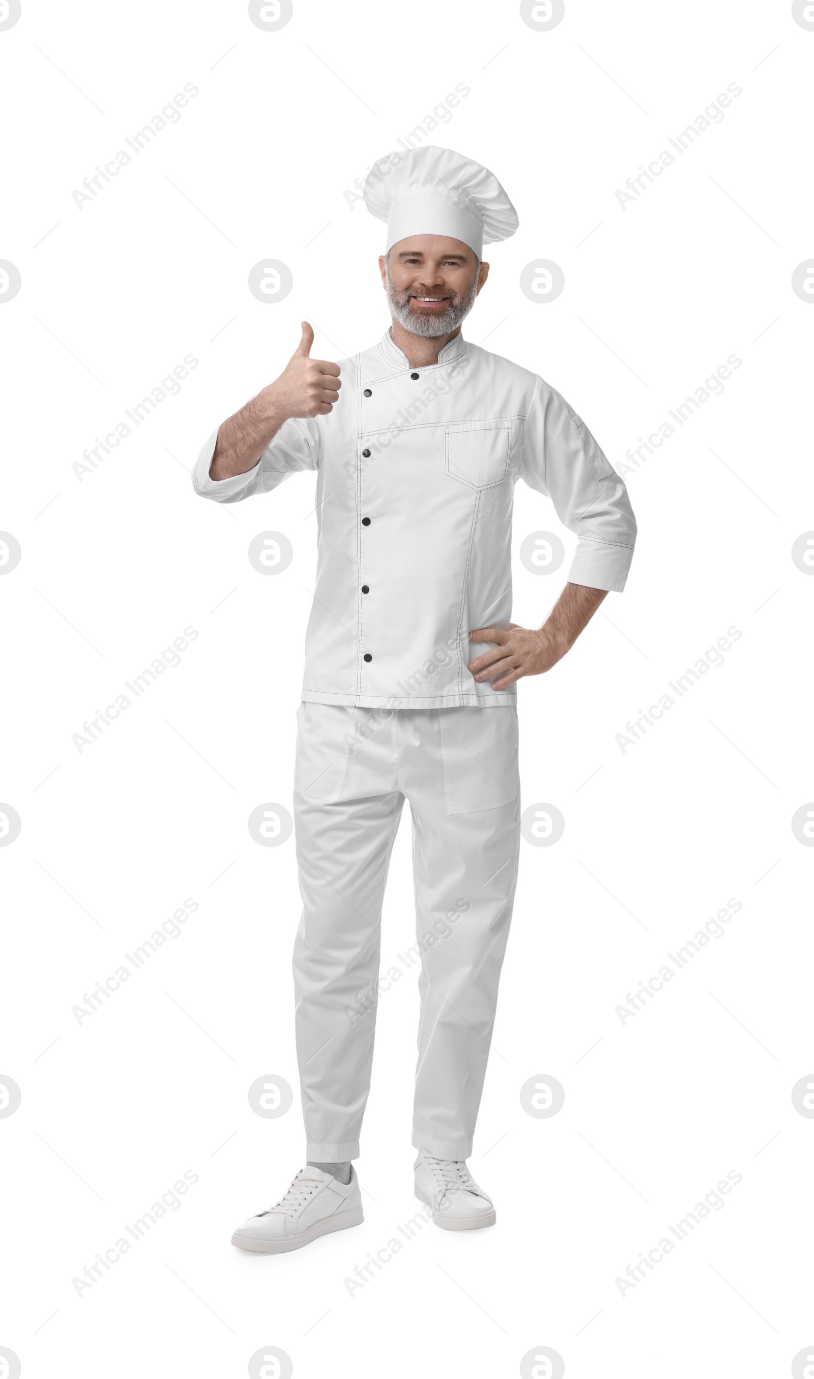 Photo of Happy chef in uniform showing thumbs up on white background