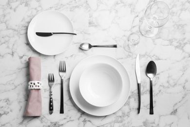 Elegant table setting on marble table, flat lay