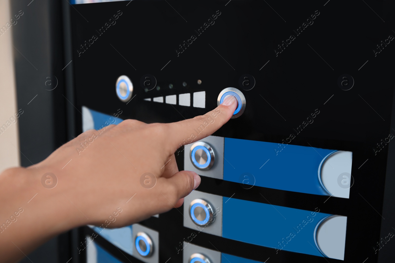 Photo of Woman choosing hot drink in coffee vending machine, closeup