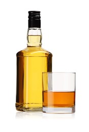 Photo of Glass and bottle of whiskey isolated on white