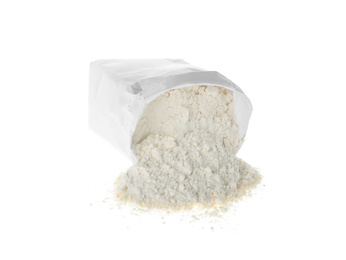 Photo of Overturned paper bag with flour isolated on white
