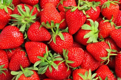 Many ripe red strawberries as background, closeup