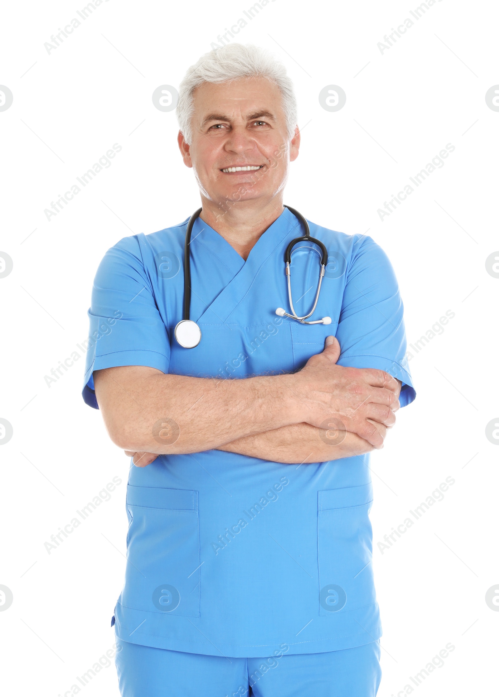 Photo of Portrait of male doctor in scrubs with stethoscope isolated on white. Medical staff