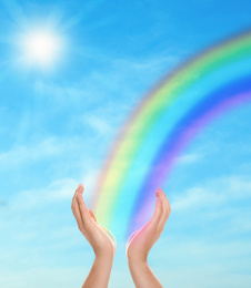 Image of Woman and rainbow as source of healing energy on sunny day, closeup