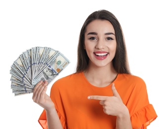 Portrait of happy young woman with money on white background