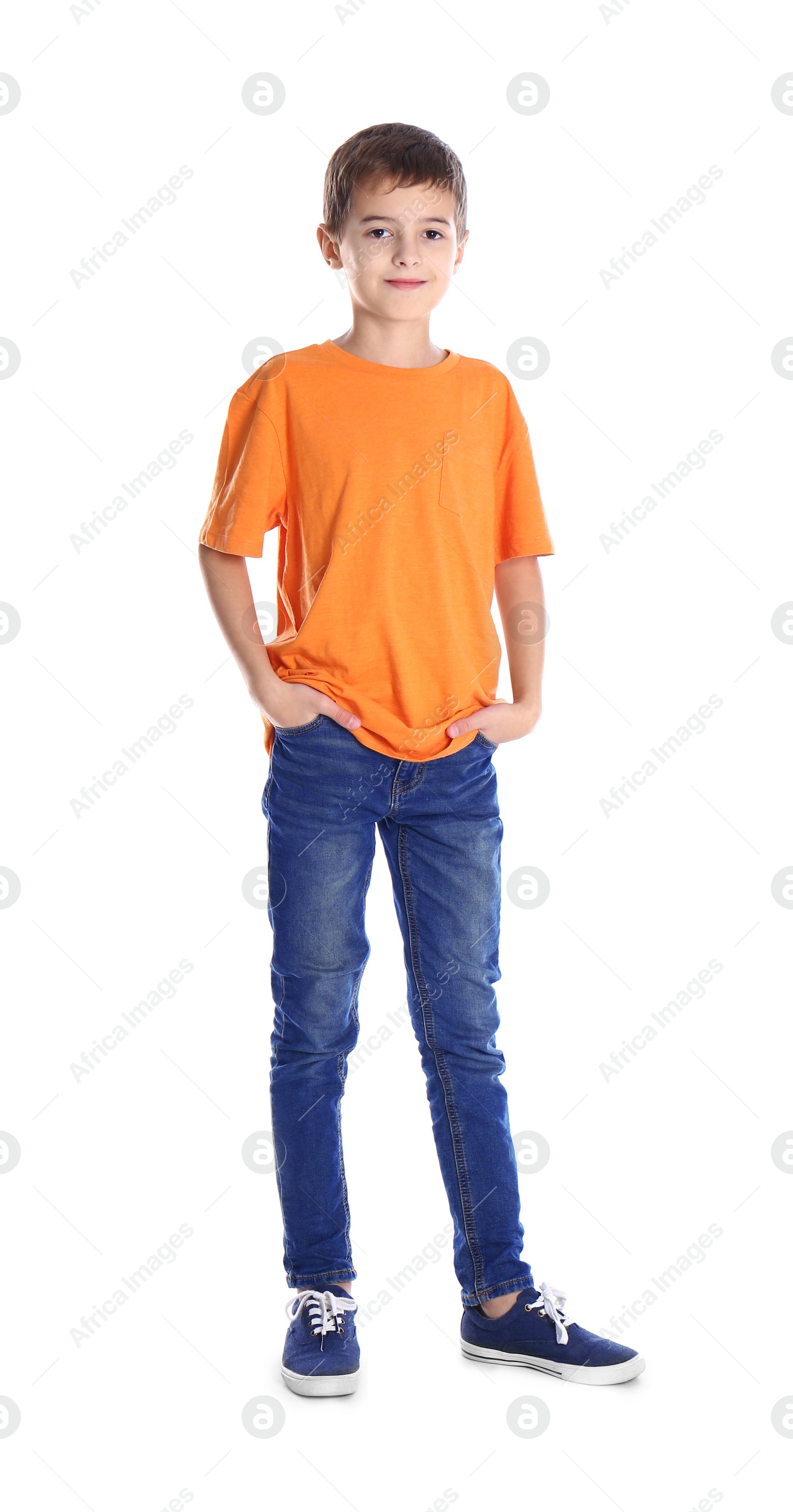 Photo of Cute little boy posing on white background