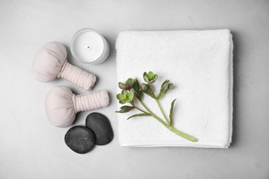Photo of Flat lay composition with spa accessories on grey background