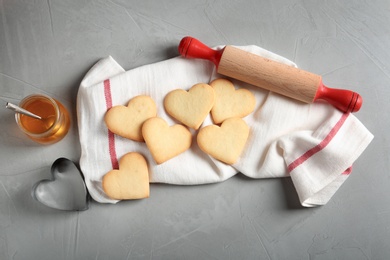 Flat lay composition with heart shaped cookies on table