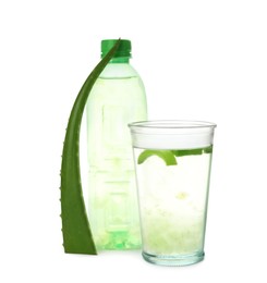 Photo of Fresh aloe drink and leaf on white background