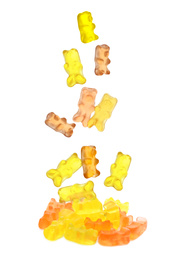 Image of Delicious jelly bears falling on white background