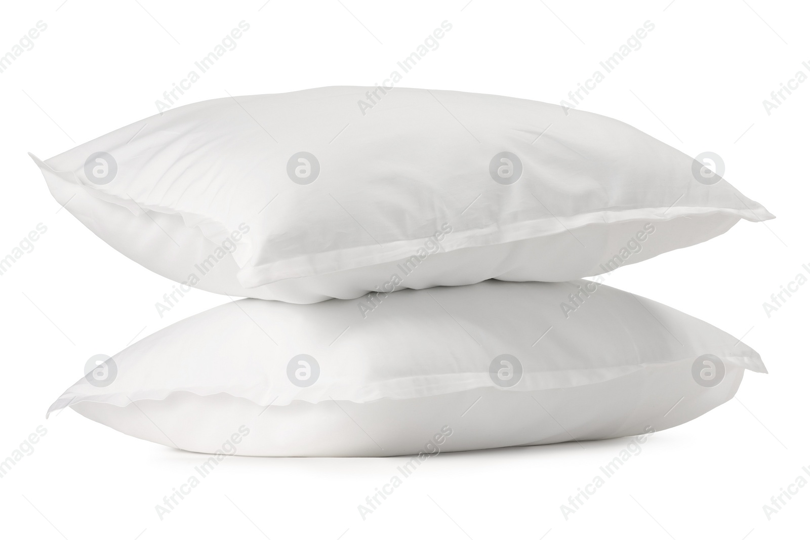 Photo of Two new soft pillows isolated on white