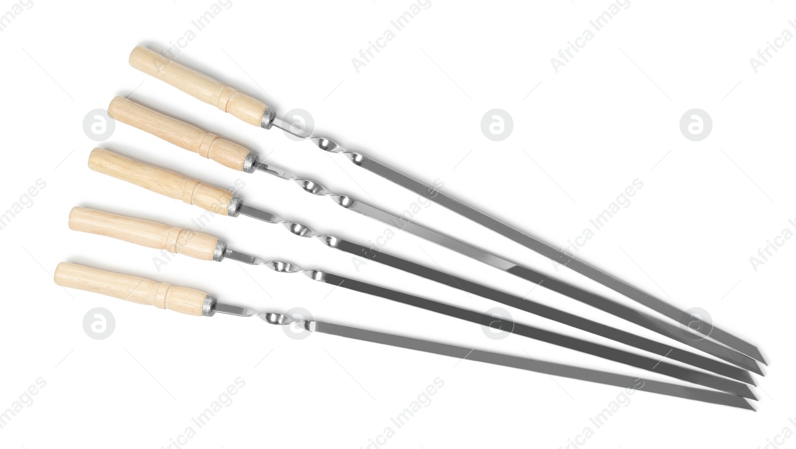 Photo of Metal skewers with wooden handle on white background, top view