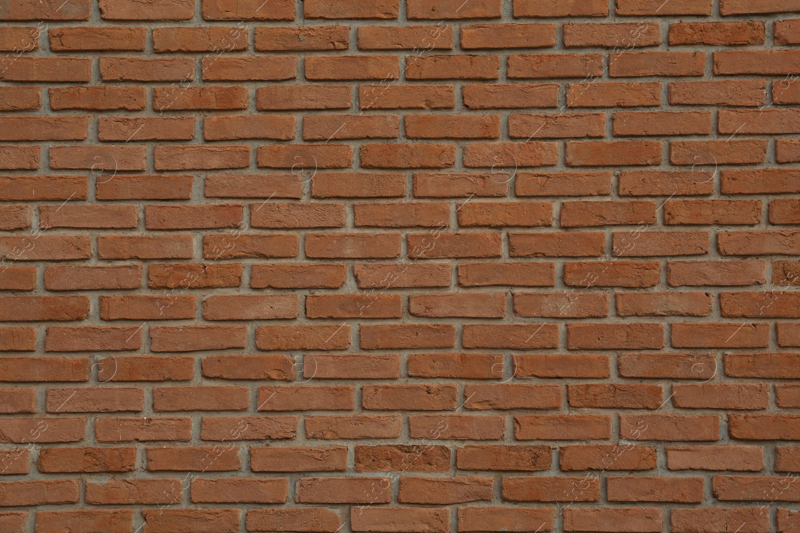 Photo of Texture of red brick wall as background