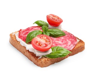 Tasty toast with cream cheese, tomato, salami and basil on white background