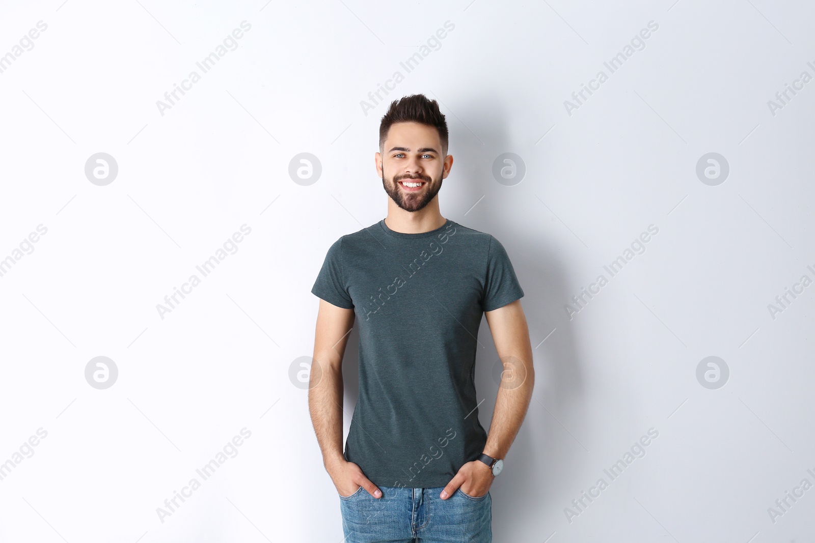 Photo of Portrait of handsome smiling man isolated on white