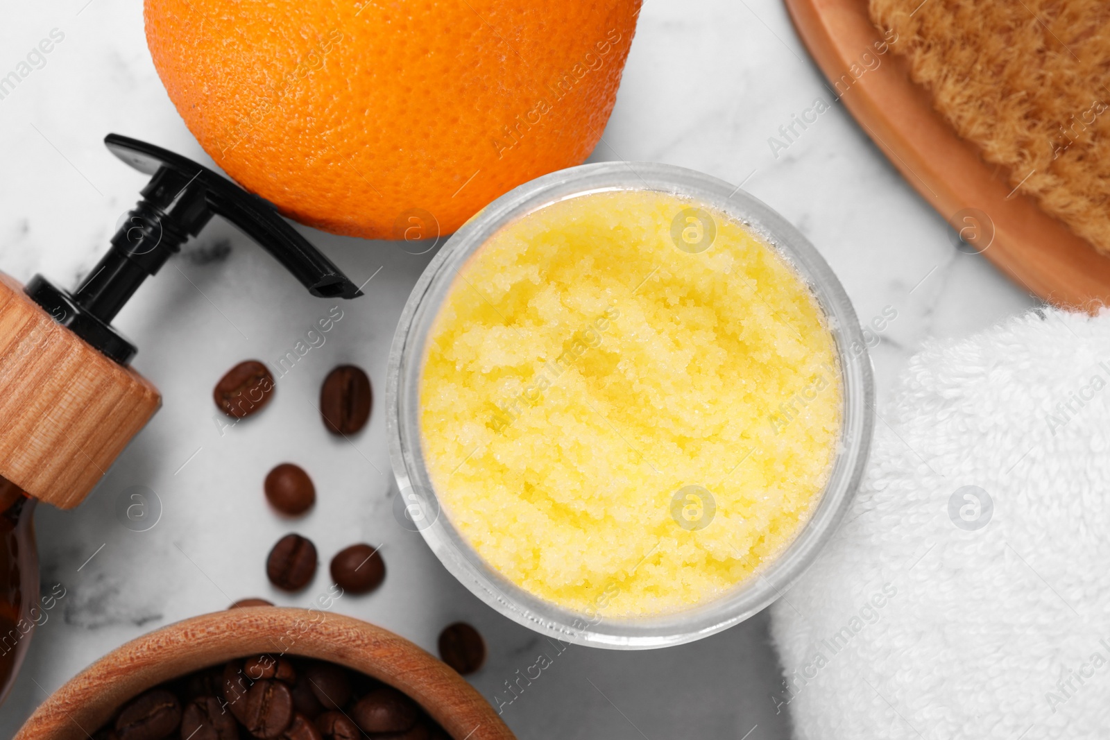 Photo of Flat lay composition with natural body scrub and fresh ingredients on white marble table. Anti cellulite treatment