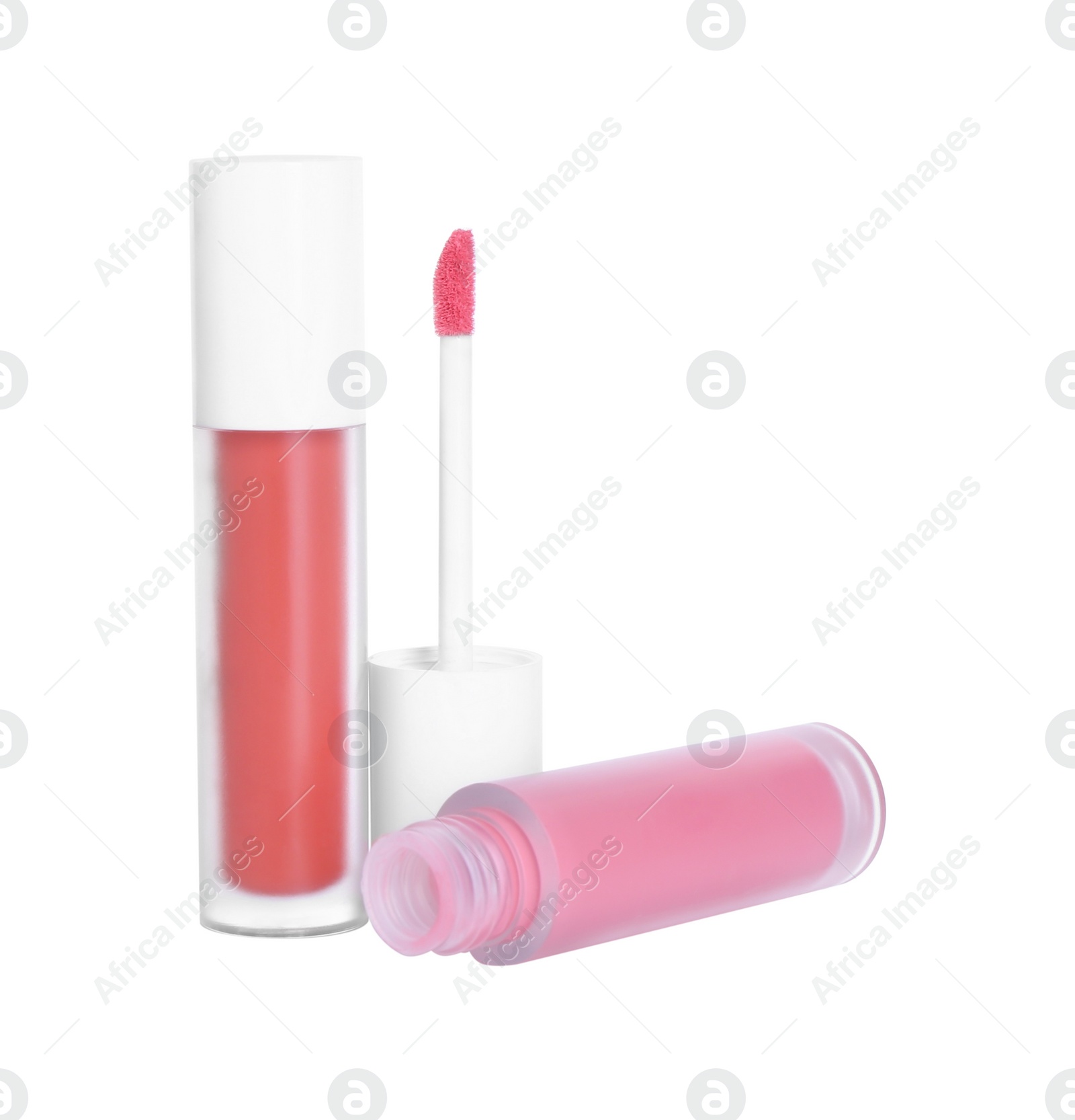 Photo of Lip glosses and applicator isolated on white. Cosmetic products