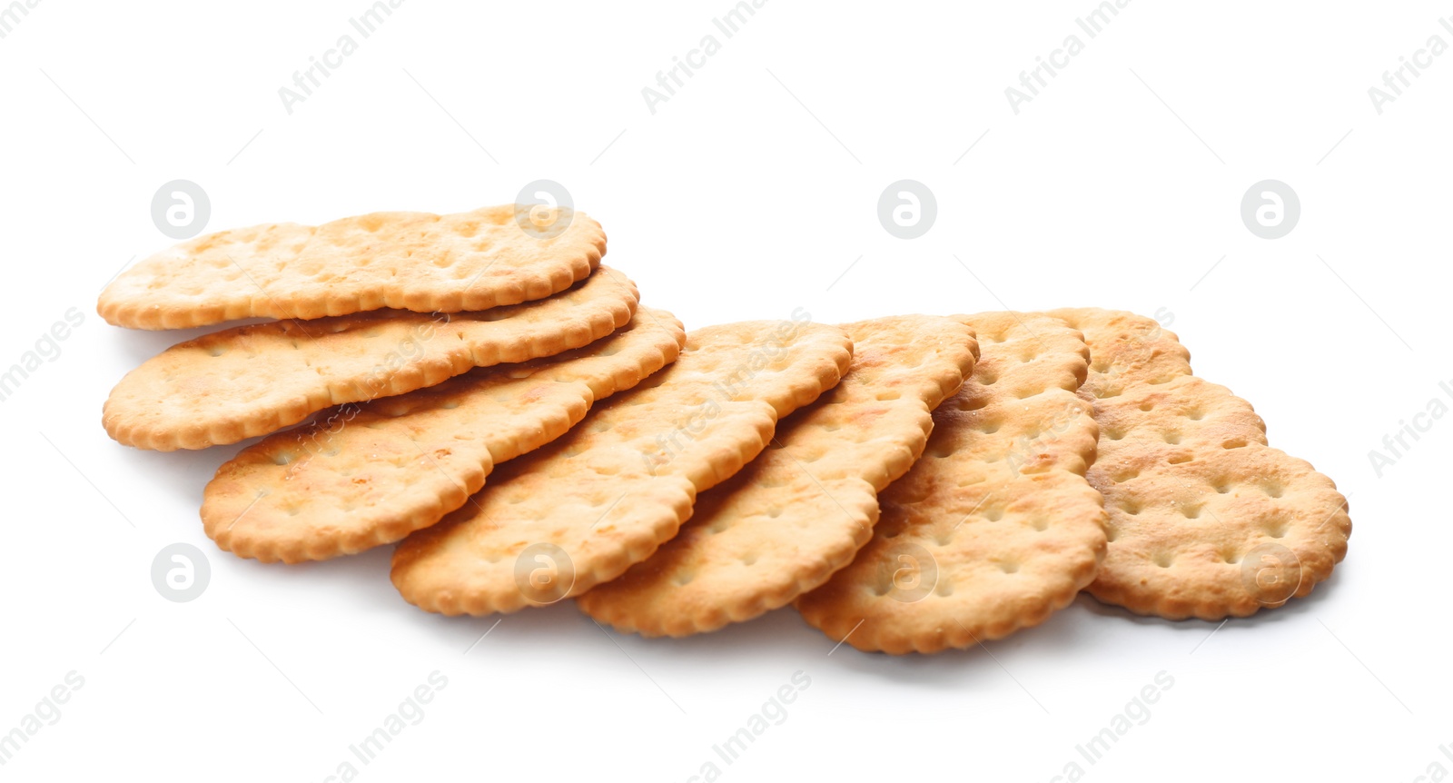 Photo of Crispy crackers isolated on white. Delicious snack