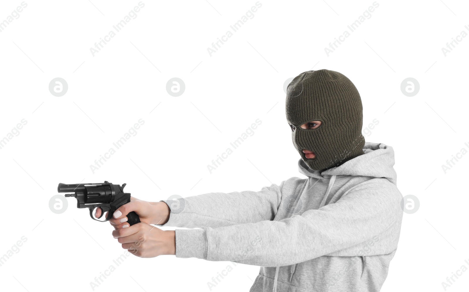 Photo of Woman wearing knitted balaclava with gun on white background