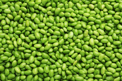 Photo of Many edamames as background, top view. Soy beans