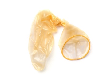 Used condom on white background. Safe sex concept