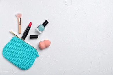 Flat lay composition with cosmetic products on light background