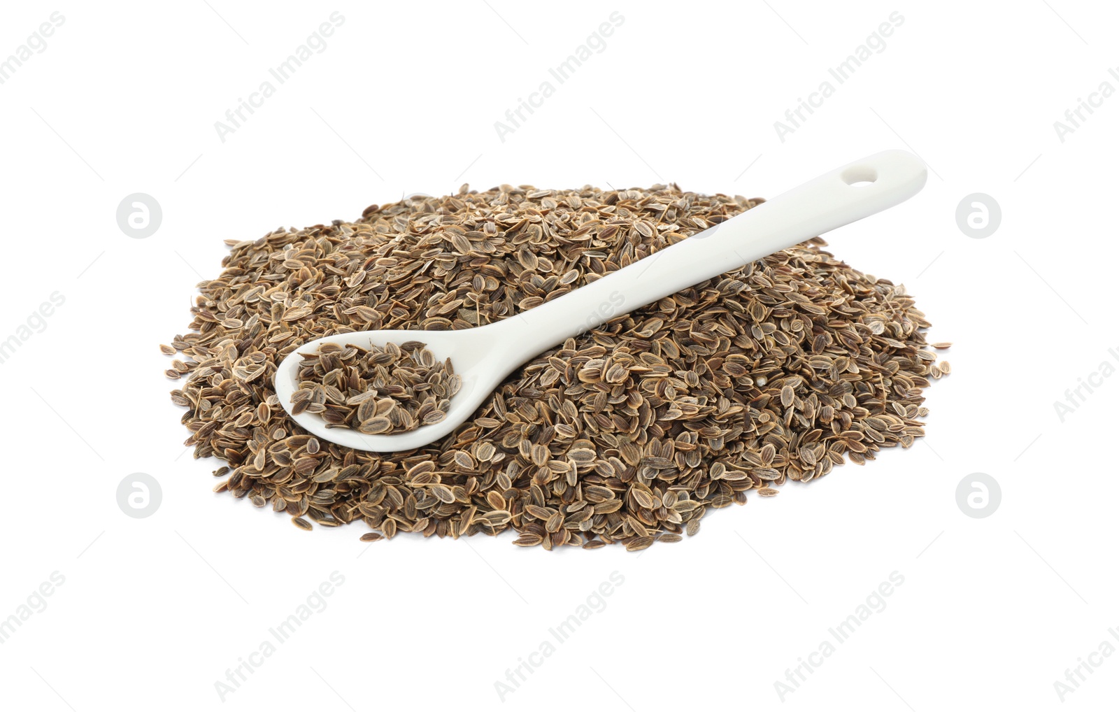 Photo of Pile of dry dill seeds and spoon isolated on white