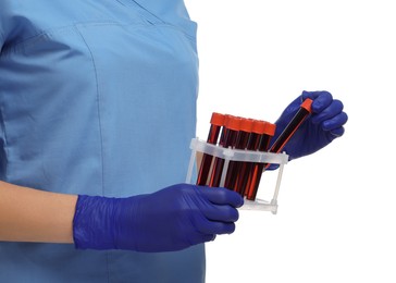 Laboratory testing. Doctor with blood samples in tubes on white background, closeup