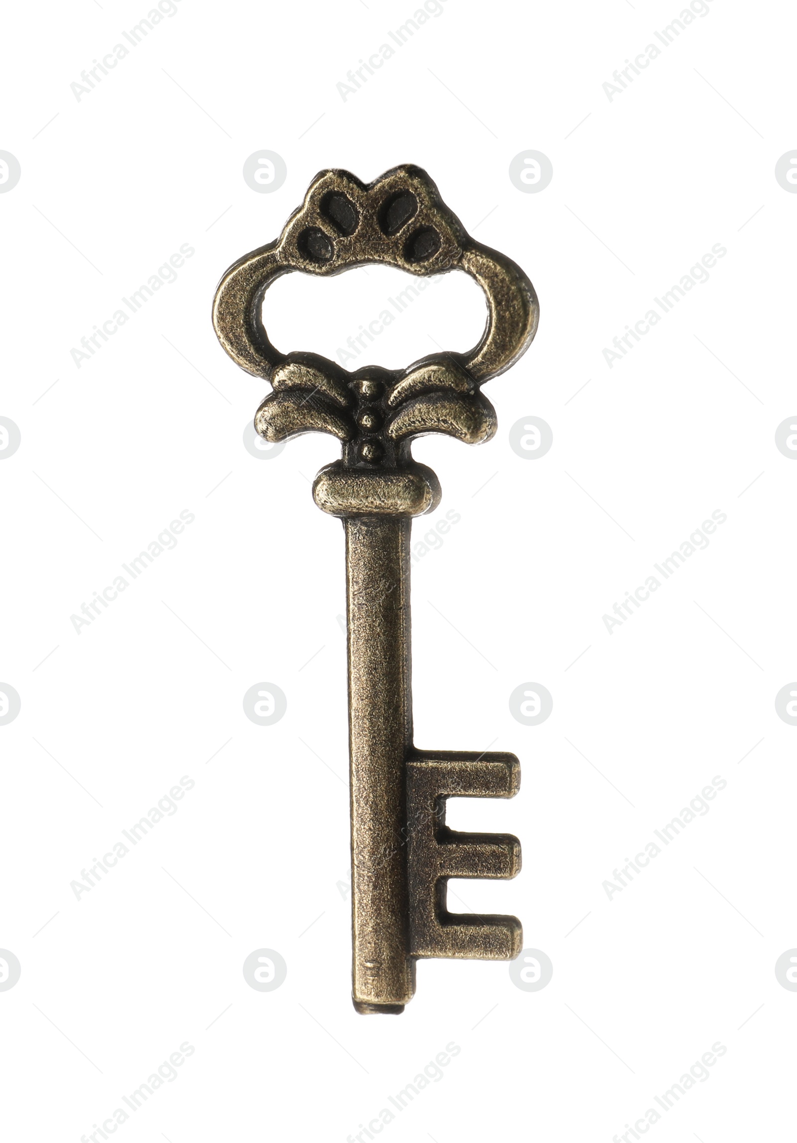 Photo of Bronze vintage ornate key on white background