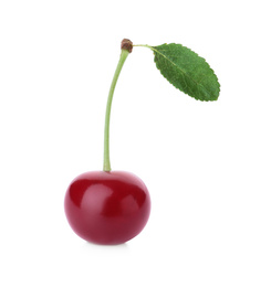 Photo of Delicious ripe sweet cherry with leaf isolated on white