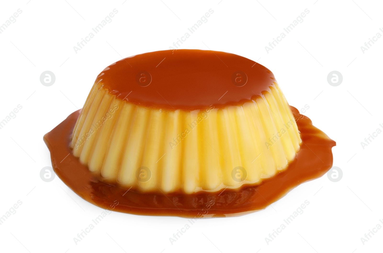 Photo of Delicious pudding with caramel isolated on white