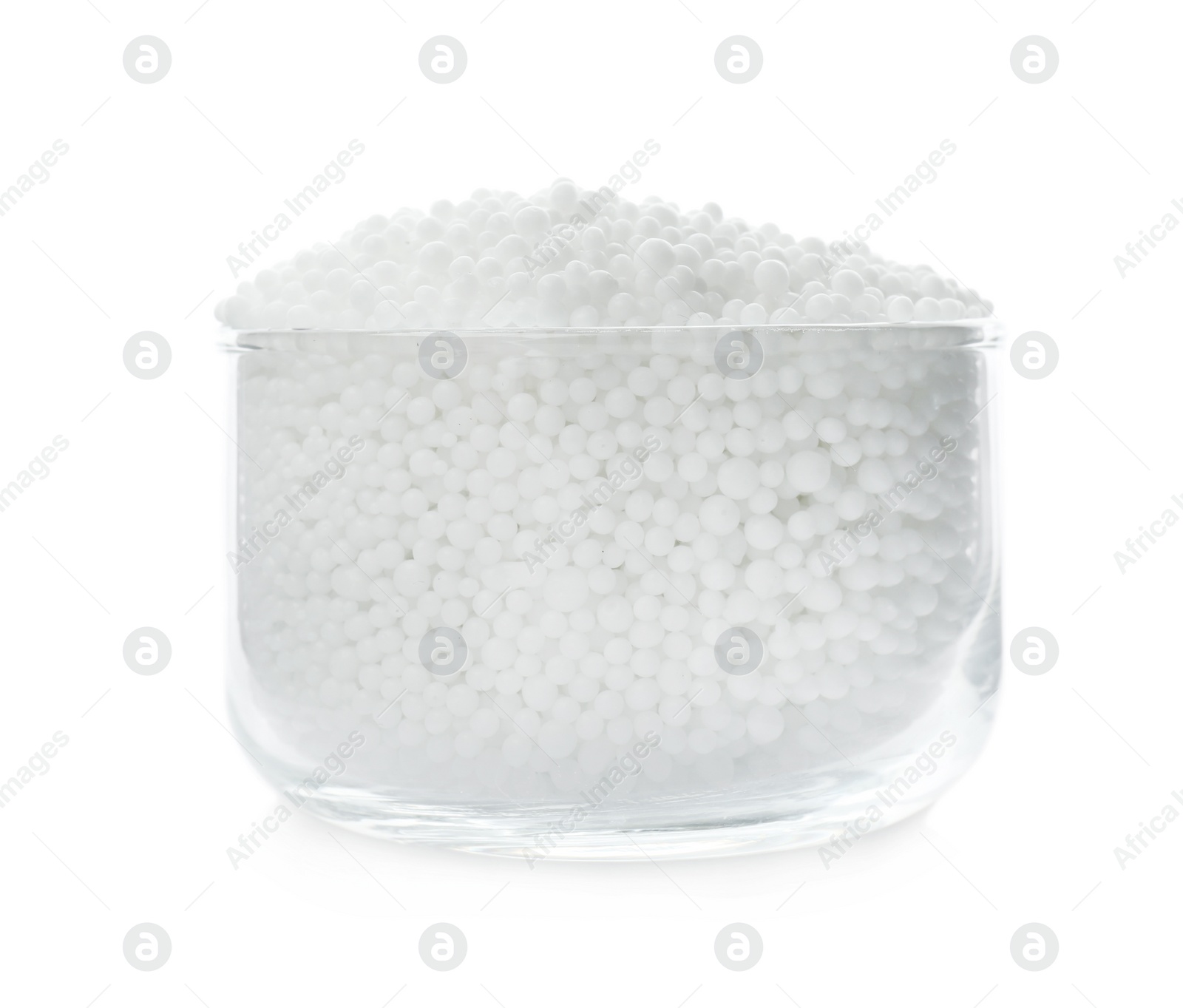 Photo of Pellets of ammonium nitrate in bowl isolated on white. Mineral fertilizer