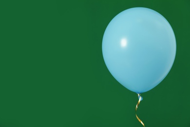 Photo of Bright balloon on color background, space for text. Celebration time