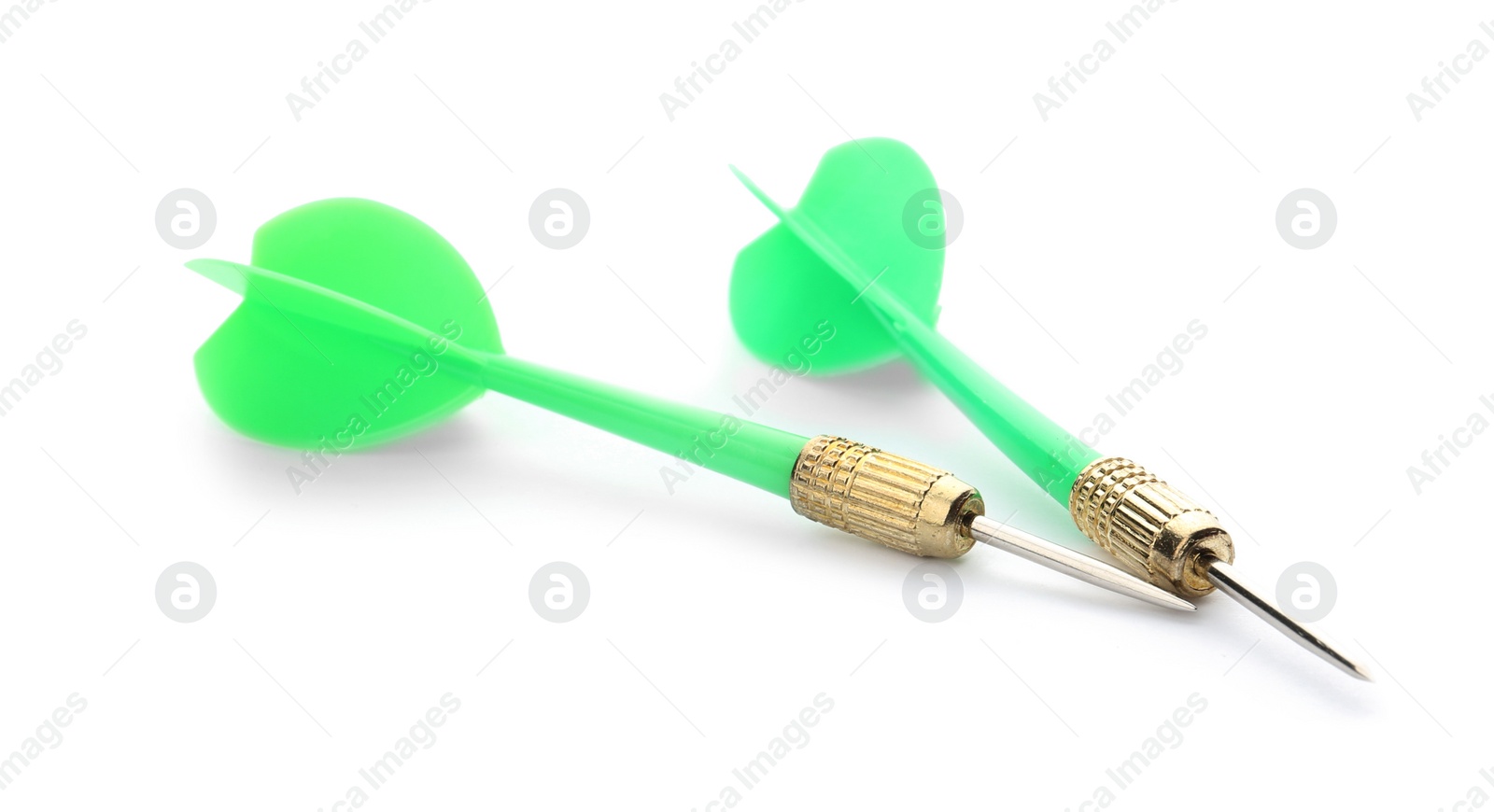 Photo of Sharp bright green darts isolated on white