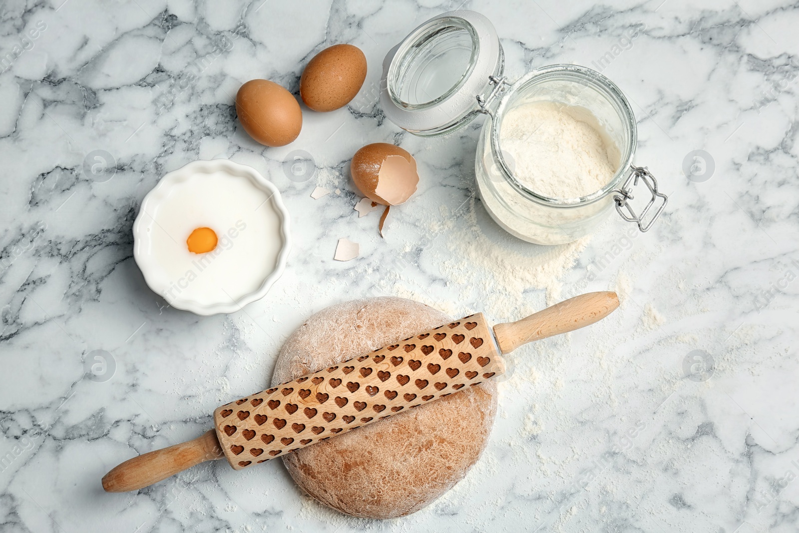 Photo of Flat lay composition with rye dough and ingredients on marble background