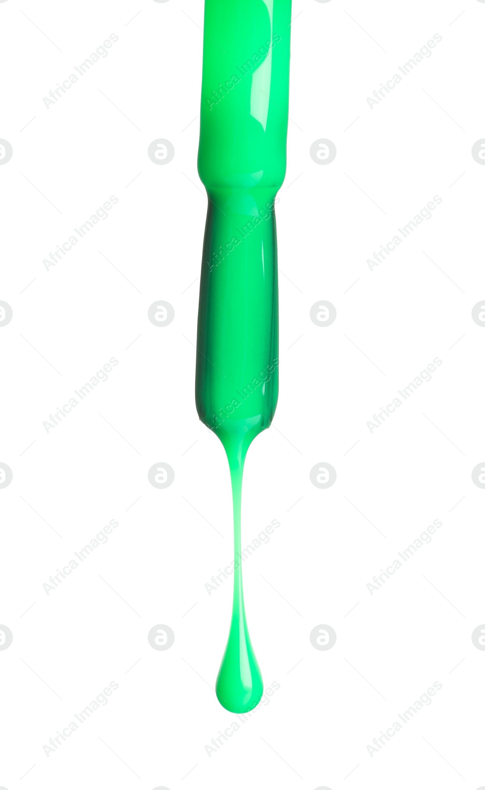 Photo of Green nail polish dripping from brush isolated on white