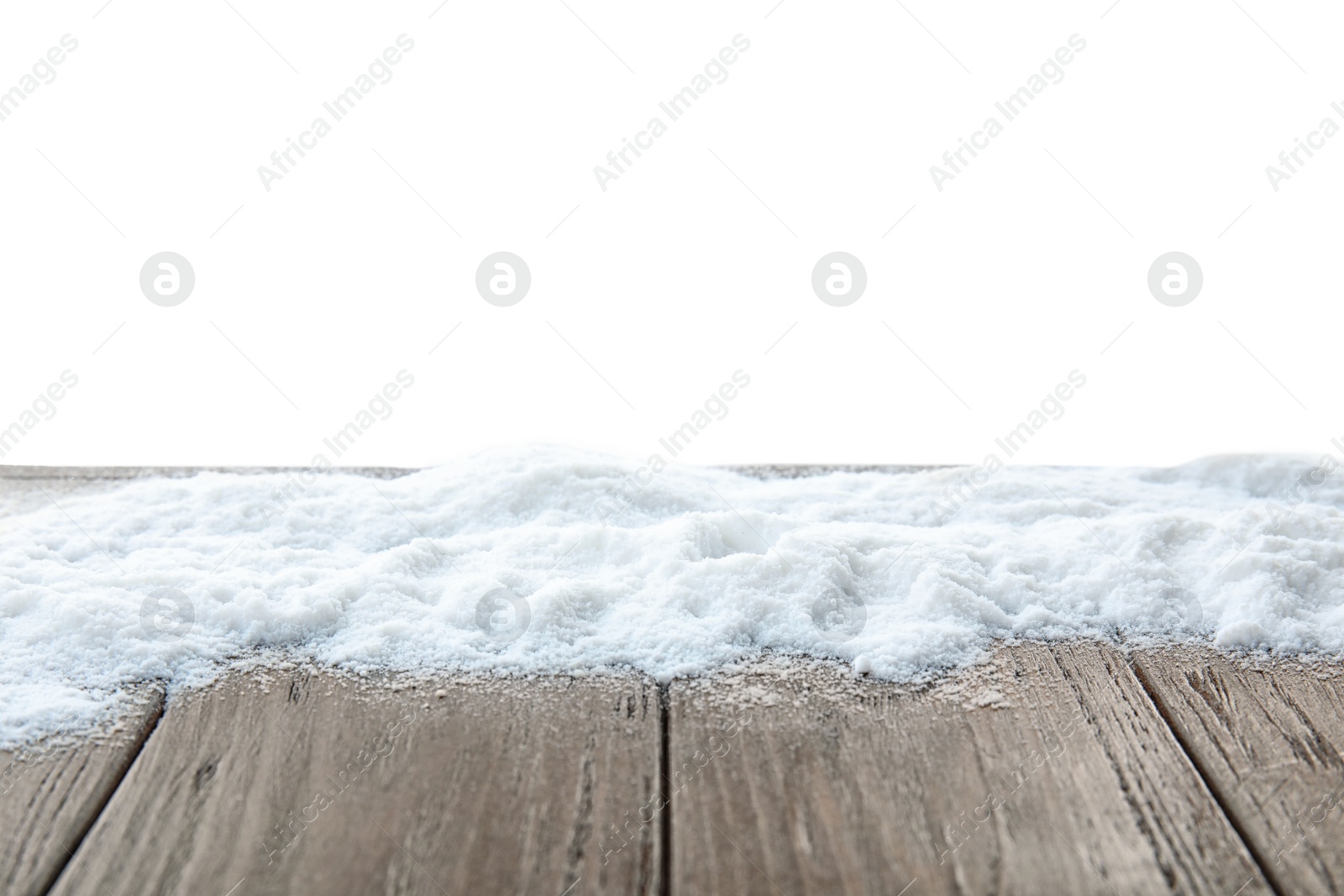 Photo of Snow on table against white background. Christmas season