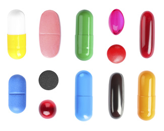 Image of Set with colorful pills on white background, top view