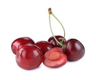 Photo of Tasty ripe red cherries isolated on white