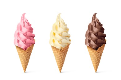 Set of different delicious soft serve ice creams in crispy cones on white background