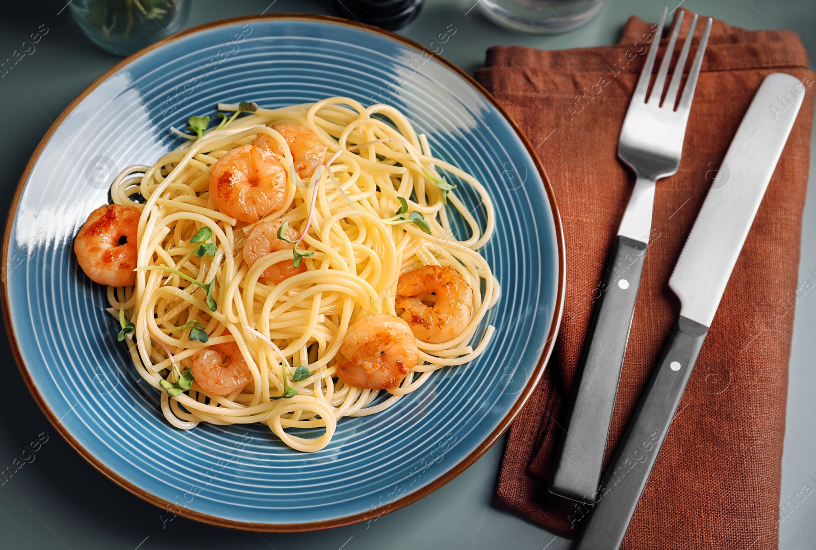 Photo of Delicious pasta with shrimps on plate