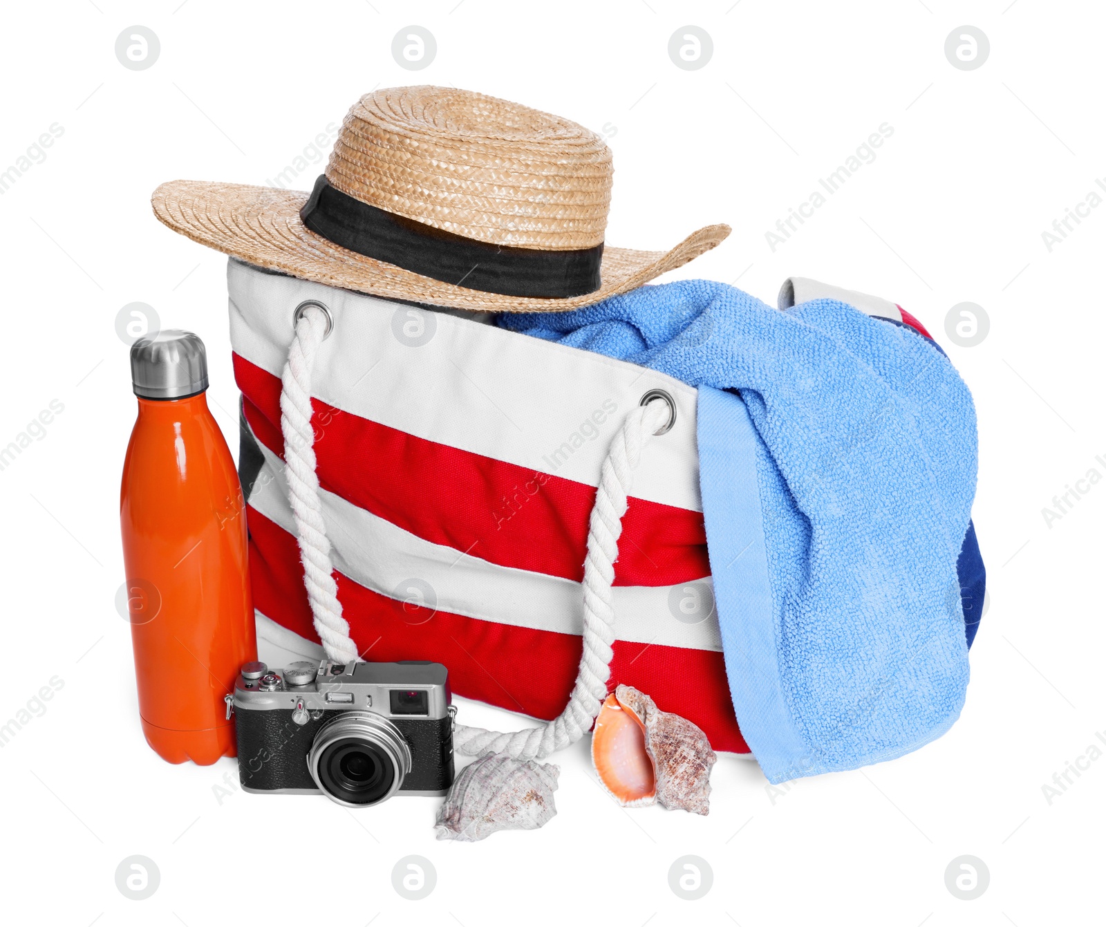 Photo of Stylish bag, camera and other beach accessories isolated on white