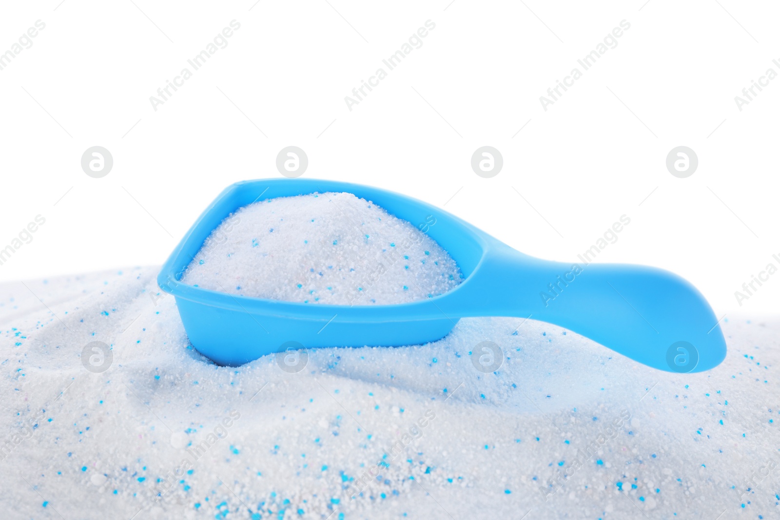 Photo of Measuring scoop with laundry powder on white background