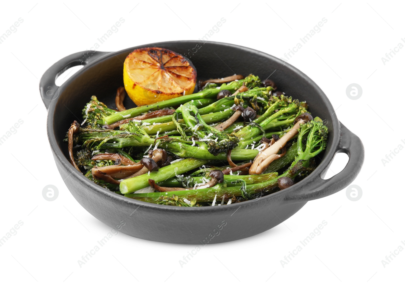 Photo of Tasty cooked broccolini, mushrooms and lemon isolated on white