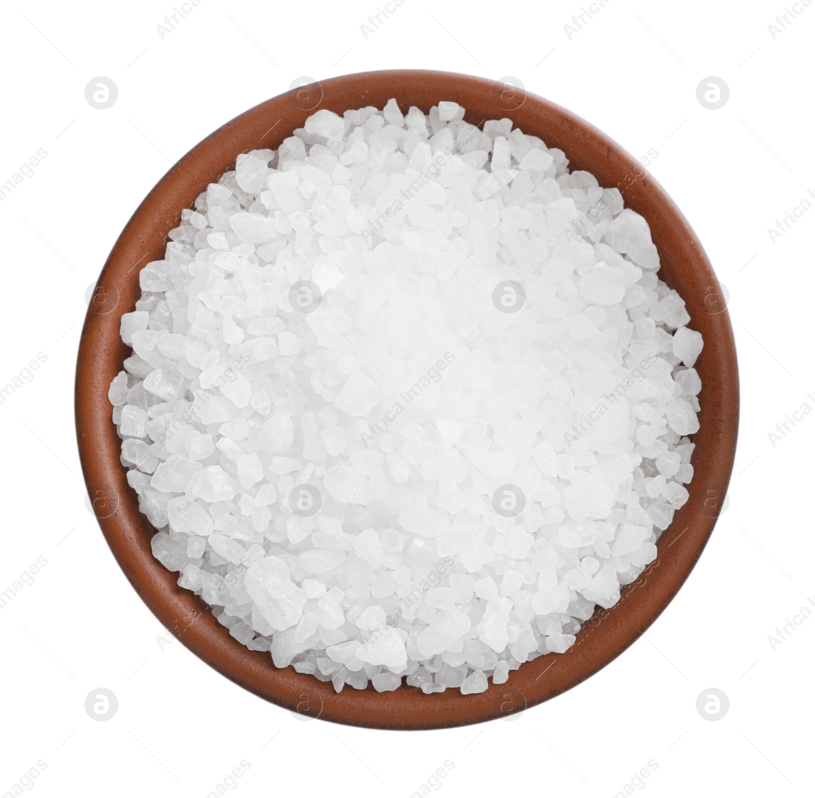 Photo of Natural salt in bowl isolated on white, top view