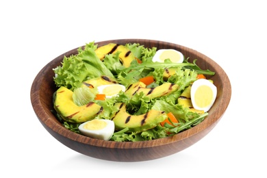 Delicious avocado salad with boiled eggs in bowl on white background