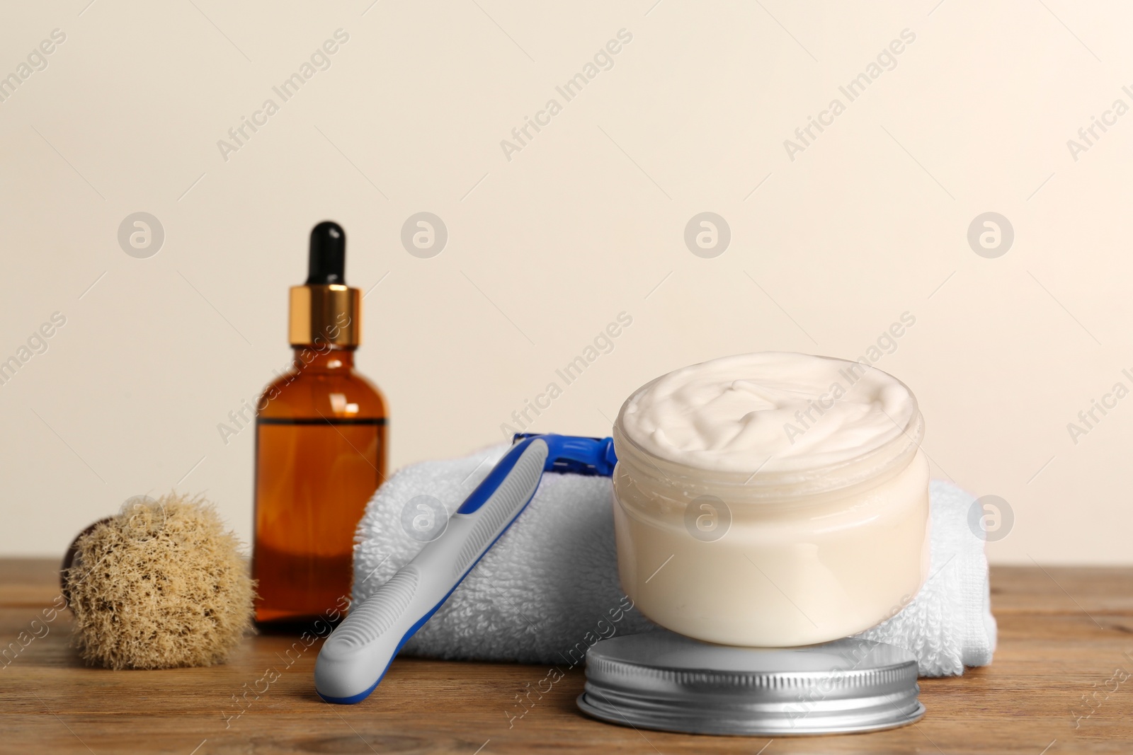 Photo of Set of men's shaving tools on wooden table