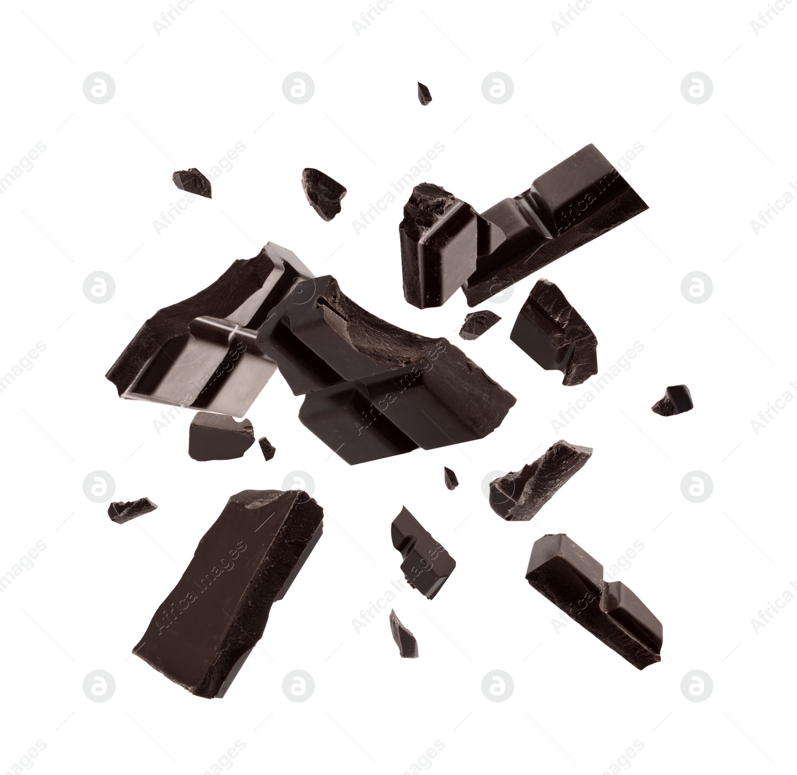 Image of Dark chocolate explosion, pieces shattering on white background